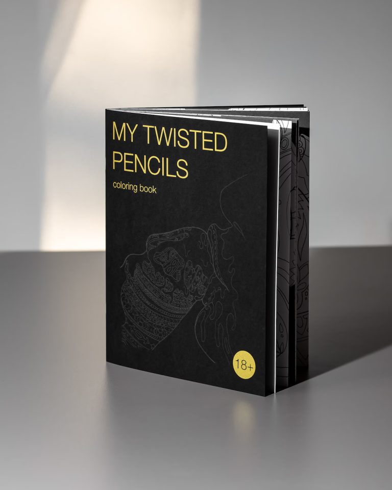 Photo of an adult coloring book featuring ornamental lineart